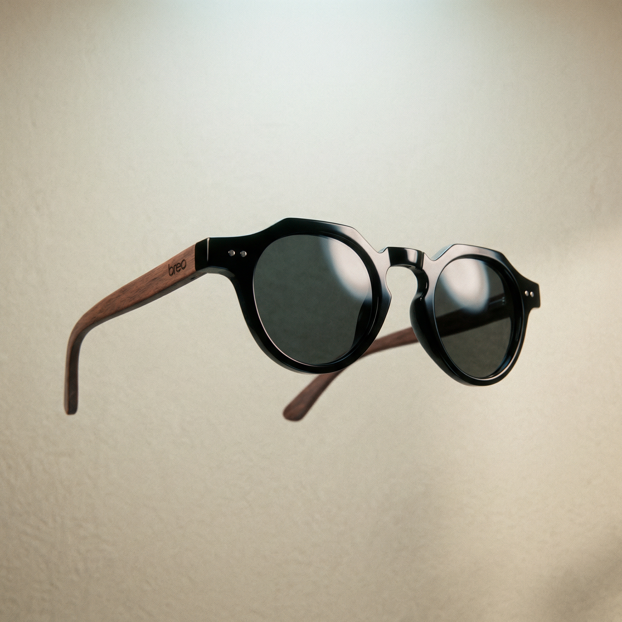 Sunglasses with wooden arms on a beige background